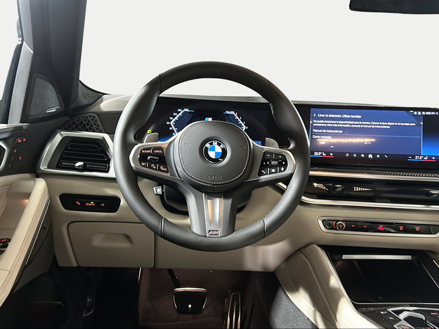 BMW X6 xDrive30d color Azul. Año 2025. 210KW(286CV). Diésel. En concesionario San Pablo Motor | Su Eminencia de Sevilla