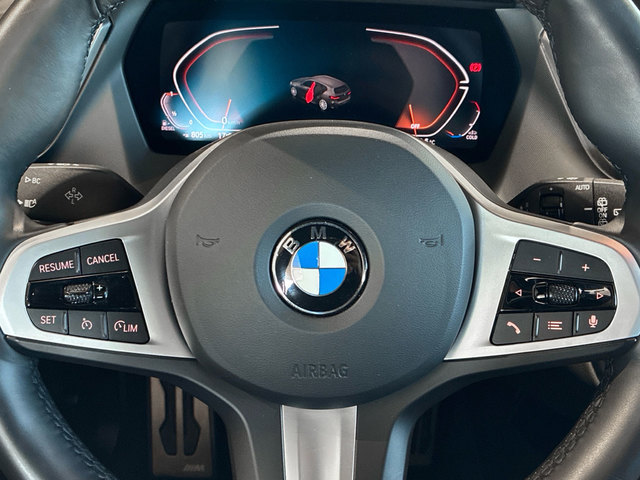 BMW Serie 1 118d color Rojo. Año 2024. 110KW(150CV). Diésel. En concesionario BMW Marcos Automoción de Valencia