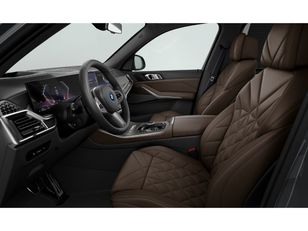 Fotos de BMW X5 xDrive50e color Gris. Año 2024. 360KW(489CV). Híbrido Electro/Gasolina. En concesionario Movilnorte El Carralero de Madrid