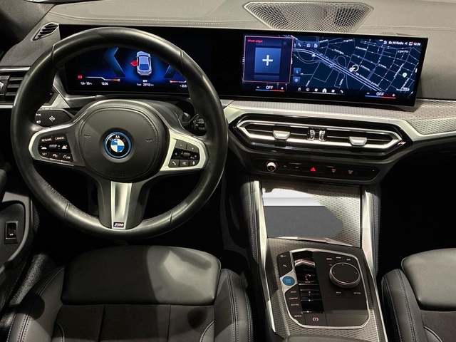 BMW i4 eDrive40 color Gris. Año 2023. 250KW(340CV). Eléctrico. En concesionario BMW Marcos Automoción de Valencia