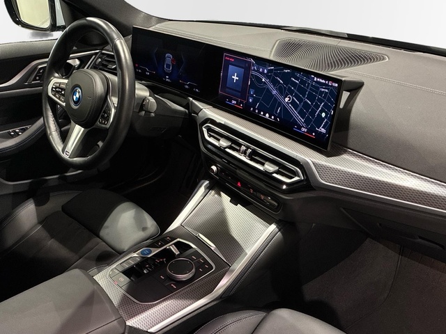 BMW i4 eDrive40 color Gris. Año 2023. 250KW(340CV). Eléctrico. En concesionario BMW Marcos Automoción de Valencia