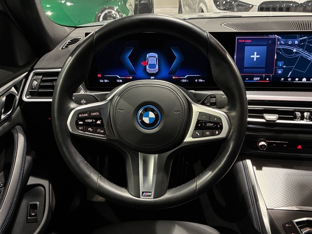 BMW i4 eDrive40 color Gris. Año 2023. 250KW(340CV). Eléctrico. En concesionario BMW Marcos Automoción de Valencia