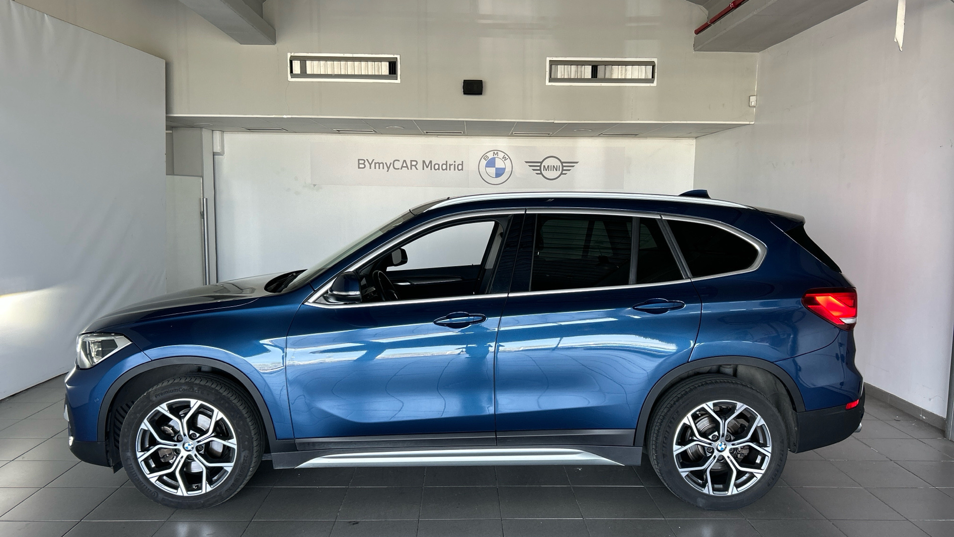 BMW X1 sDrive18d color Naranja. Año 2021. 110KW(150CV). Diésel. En concesionario BYmyCAR Madrid - Alcalá de Madrid