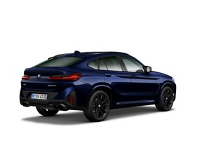 Fotos de BMW X4 M40d color Azul. Año 2024. 250KW(340CV). Diésel. En concesionario Movilnorte El Plantio de Madrid
