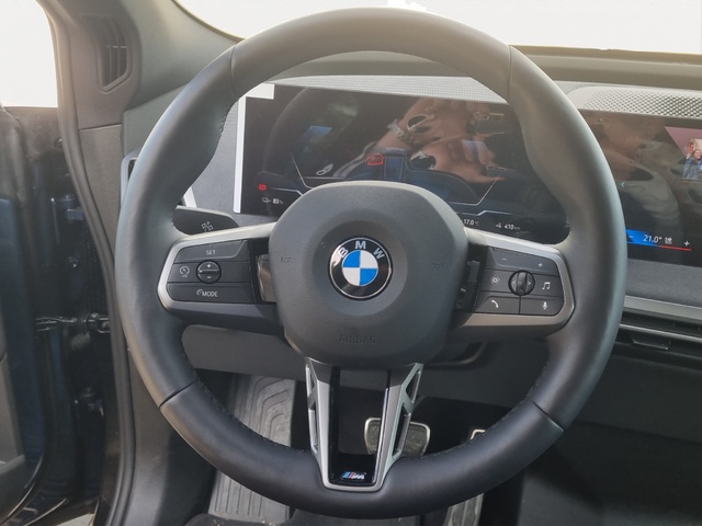 BMW iX xDrive45 color Azul. Año 2025. 300KW(408CV). Eléctrico. En concesionario SAN JUAN Automoviles Fersan S.A. de Alicante