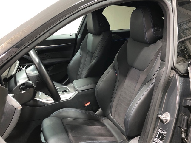 BMW i4 eDrive40 color Gris. Año 2023. 250KW(340CV). Eléctrico. En concesionario Movilnorte El Plantio de Madrid