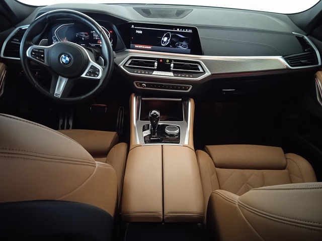BMW X6 xDrive30d color Negro. Año 2023. 210KW(286CV). Híbrido Electro/Diesel. En concesionario ALBAMOCION CIUDAD REAL  de Ciudad Real
