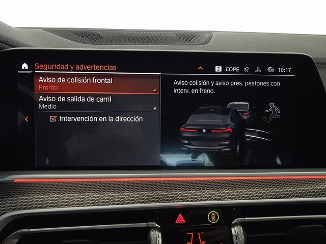 BMW X6 xDrive30d color Negro. Año 2023. 210KW(286CV). Híbrido Electro/Diesel. En concesionario ALBAMOCION CIUDAD REAL  de Ciudad Real