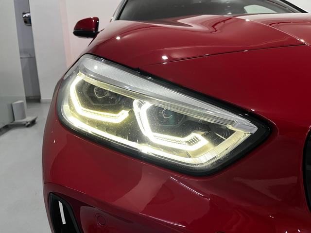 BMW Serie 1 118d color Rojo. Año 2020. 110KW(150CV). Diésel. En concesionario Unicars Ponent de Lleida