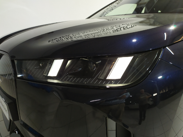 BMW iX xDrive45 color Negro. Año 2025. 300KW(408CV). Eléctrico. En concesionario Hispamovil Elche de Alicante