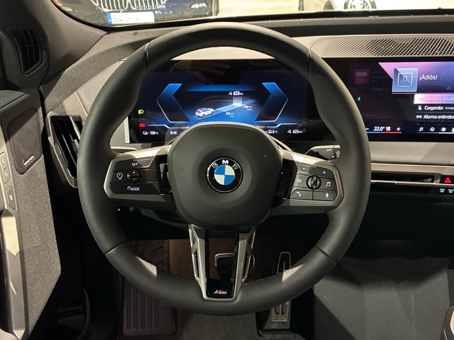 BMW iX xDrive60 color Gris. Año 2025. 400KW(544CV). Eléctrico. En concesionario BMW Marcos Automoción de Valencia