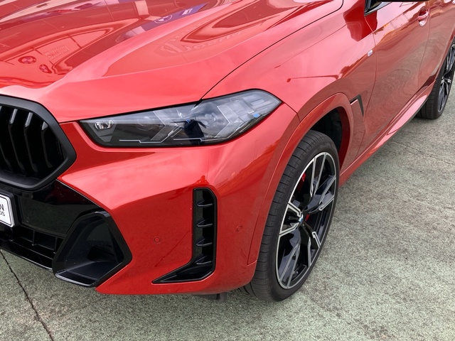 BMW X6 xDrive40d color Naranja. Año 2024. 259KW(352CV). Diésel. En concesionario Bernesga Motor León (Bmw y Mini) de León