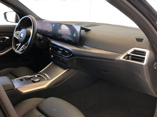BMW Serie 3 320d Touring color Negro. Año 2024. 140KW(190CV). Diésel. En concesionario Vehinter Getafe de Madrid