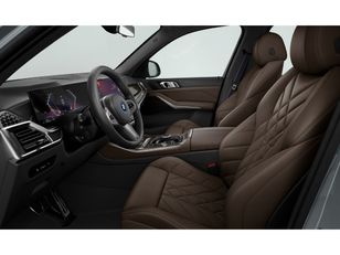 Fotos de BMW X5 xDrive50e color Gris. Año 2024. 360KW(489CV). Híbrido Electro/Gasolina. En concesionario Movilnorte El Carralero de Madrid