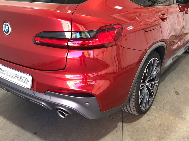 BMW X4 xDrive20i color Rojo. Año 2021. 135KW(184CV). Gasolina. En concesionario Movilnorte Las Rozas de Madrid