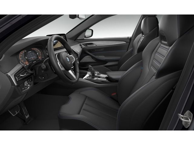 BMW Serie 5 M550i color Negro. Año 2021. 390KW(530CV). Gasolina. En concesionario Amiocar S.A. de Coruña