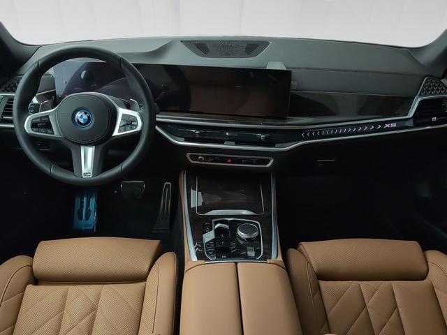 BMW X5 xDrive50e color Negro. Año 2024. 360KW(489CV). Híbrido Electro/Gasolina. En concesionario Automotor Premium Viso - Málaga de Málaga