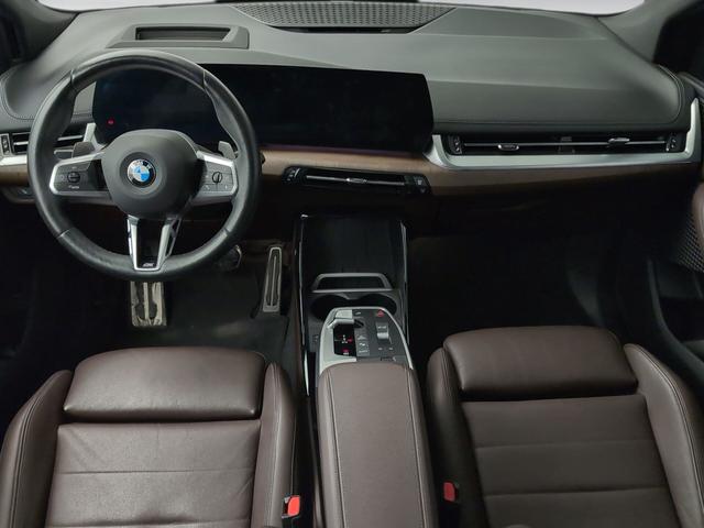 BMW Serie 2 218i Active Tourer color Verde. Año 2022. 100KW(136CV). Gasolina. En concesionario Automotor Premium Velázquez - Málaga de Málaga