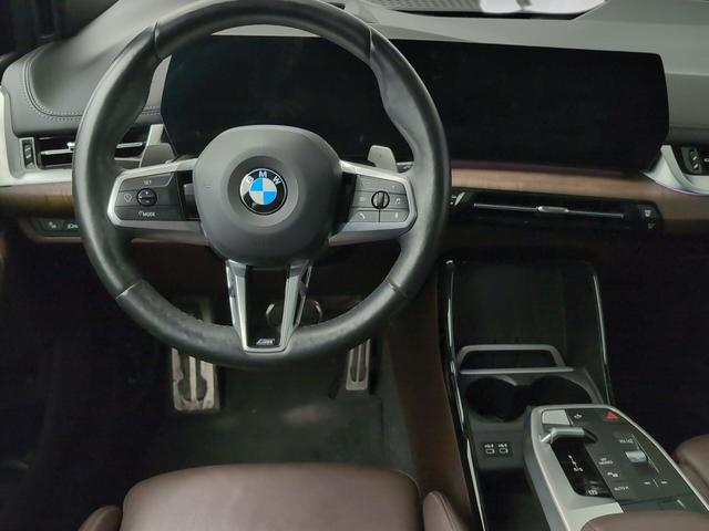 BMW Serie 2 218i Active Tourer color Verde. Año 2022. 100KW(136CV). Gasolina. En concesionario Automotor Premium Velázquez - Málaga de Málaga