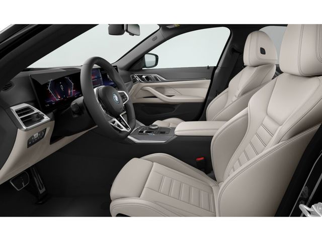 BMW i4 eDrive40 color Negro. Año 2025. 250KW(340CV). Eléctrico. En concesionario Caetano Cuzco, Alcalá de Madrid