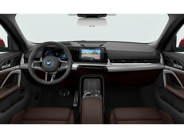 BMW iX2 eDrive20 color Rojo. Año 2025. 150KW(204CV). Eléctrico. En concesionario Oliva Motor Girona de Girona