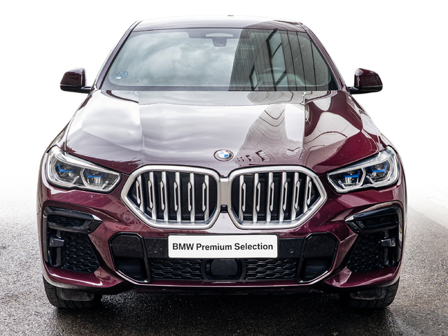 BMW X6 xDrive30d color Violeta. Año 2022. 210KW(286CV). Diésel. En concesionario Caetano Cuzco, Alcalá de Madrid