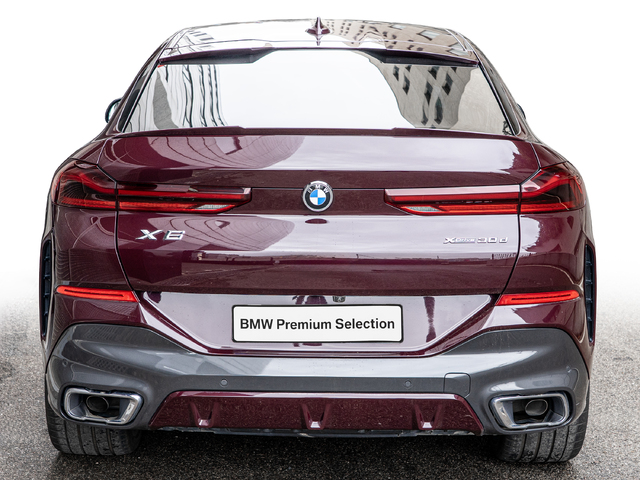 BMW X6 xDrive30d color Violeta. Año 2022. 210KW(286CV). Diésel. En concesionario Caetano Cuzco, Alcalá de Madrid