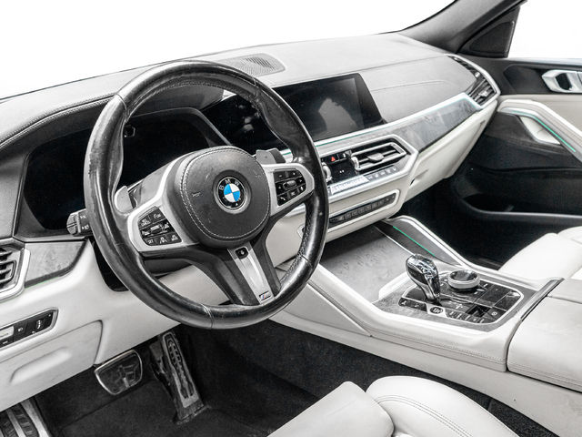 BMW X6 xDrive30d color Violeta. Año 2022. 210KW(286CV). Diésel. En concesionario Caetano Cuzco, Alcalá de Madrid