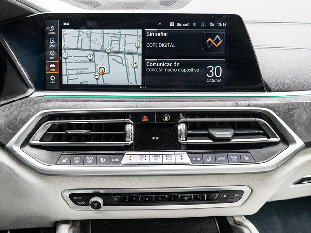 BMW X6 xDrive30d color Violeta. Año 2022. 210KW(286CV). Diésel. En concesionario Caetano Cuzco, Alcalá de Madrid