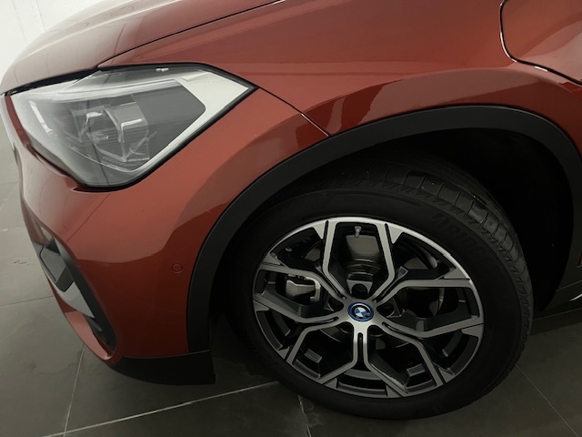 BMW X1 xDrive25e color Naranja. Año 2022. 162KW(220CV). Híbrido Electro/Gasolina. En concesionario Amiocar S.A. de Coruña