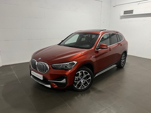 Fotos de BMW X1 xDrive25e color Naranja. Año 2022. 162KW(220CV). Híbrido Electro/Gasolina. En concesionario Amiocar S.A. de Coruña