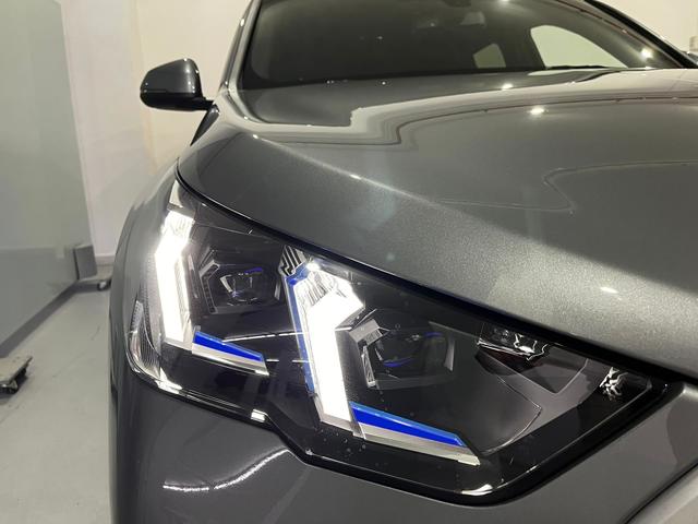 BMW iX2 eDrive20 color Gris. Año 2025. 150KW(204CV). Eléctrico. En concesionario Unicars Ponent de Lleida